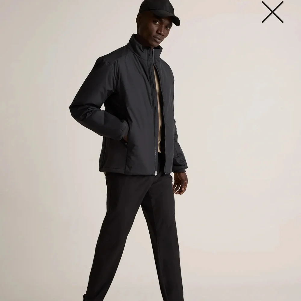 Quince Black Windbreaker Jacket with High Collar and Matte Finish - Picture 2 of 7